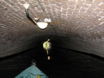 Inside the long, watercraft tunnel under Zutphen streets. Notice the chrome pull bars.