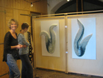 Artist with her unusual creation using special wool, at the windmill art exhibit in Zutphen